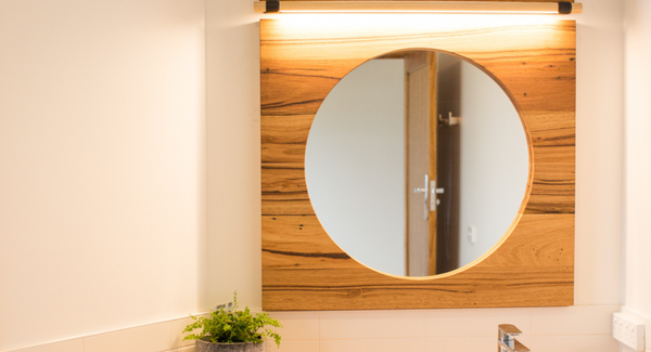 Round timber bathroom mirror
