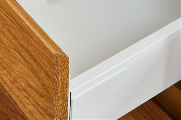 image showing white melamine internals for a timber bedside table.