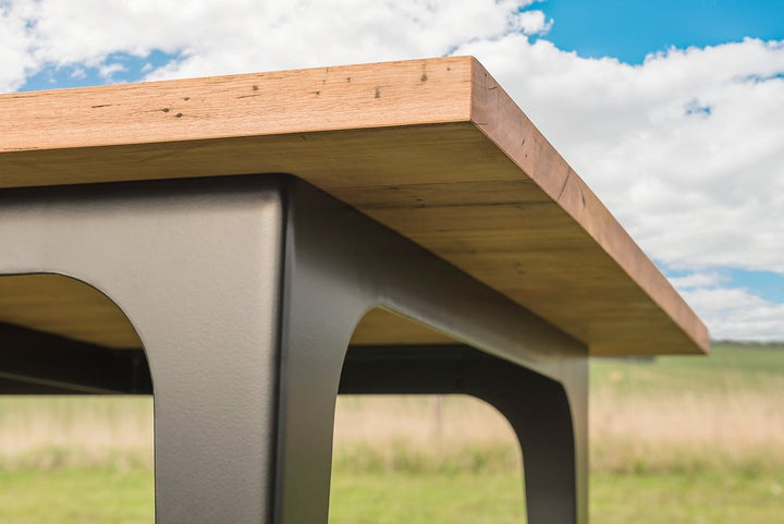 Metal, concrete and fabric- the beauty of contrasts in timber furniture