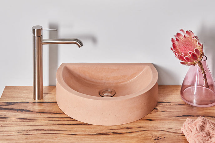Hand poured concrete basin pink half circle
