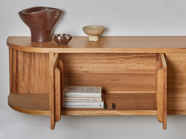 TV cabinet with curved ends and cupboards