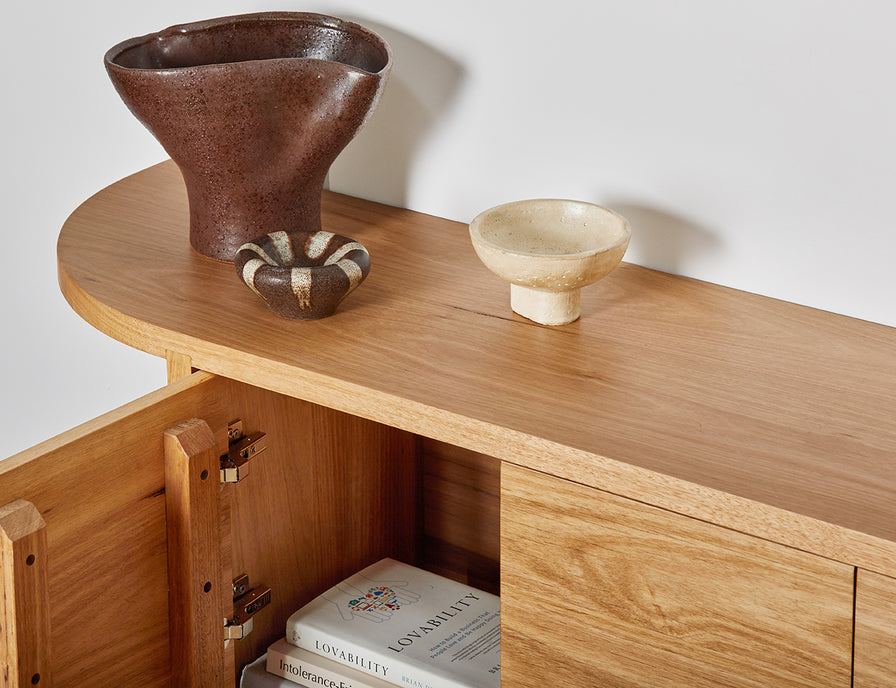 Wall hung wooden TV cabinet with curved ends