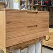 custom sized wooden vanity with drawers