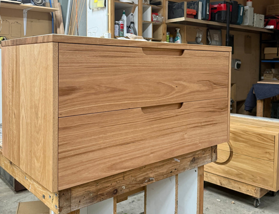 custom sized wooden vanity with drawers