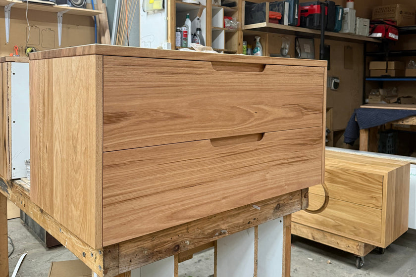 custom sized wooden vanity with drawers