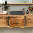 Recycled wood vankty with curved ends and cupboards