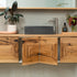 Recycled wood vankty with curved ends and cupboards