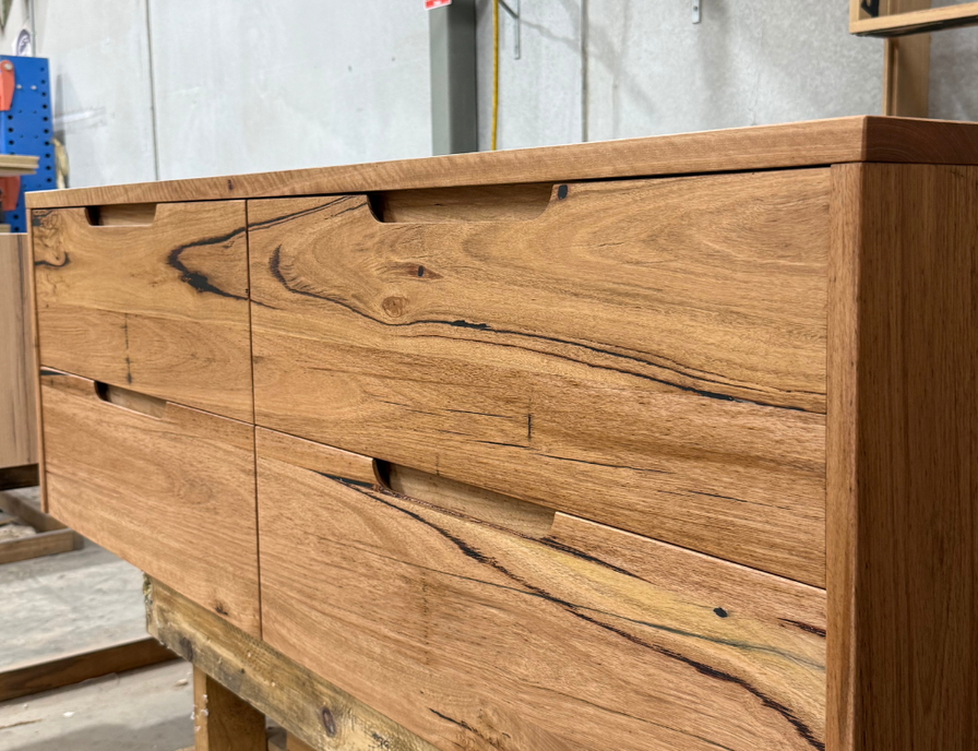 Close up of inverloch timber vanity with integrated handles