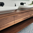 Walnut timber vanity with drawers and open shelf