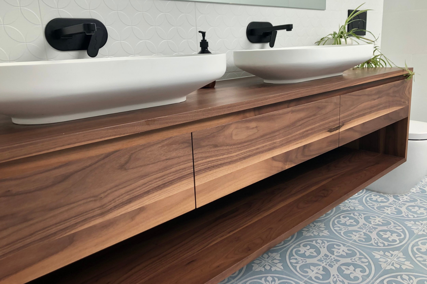 Walnut timber vanity with drawers and open shelf