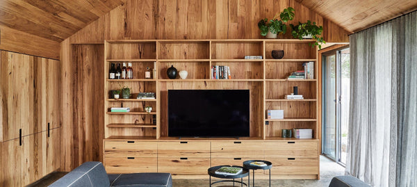 Messmate timber large entertainment unit with drawers and bookcase display. In a home in Torquay on the victorian surf coast. 