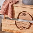 Close up of round handle detail on floating timber vanity