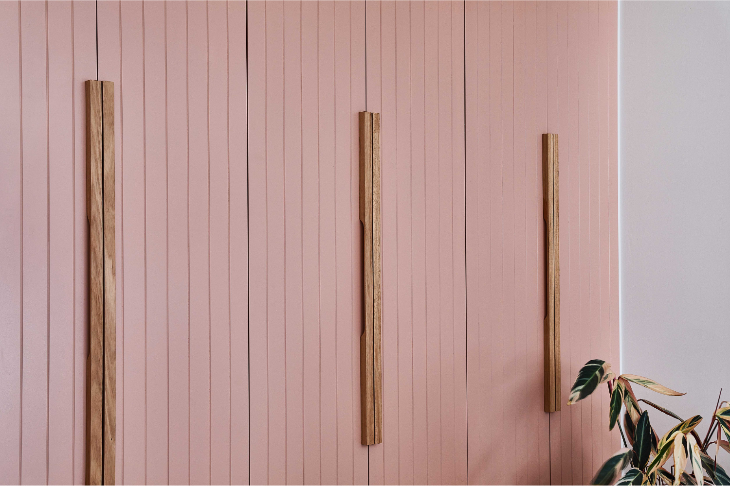 hand made wooden linear cabinetry handle