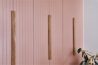 hand made wooden linear cabinetry handle