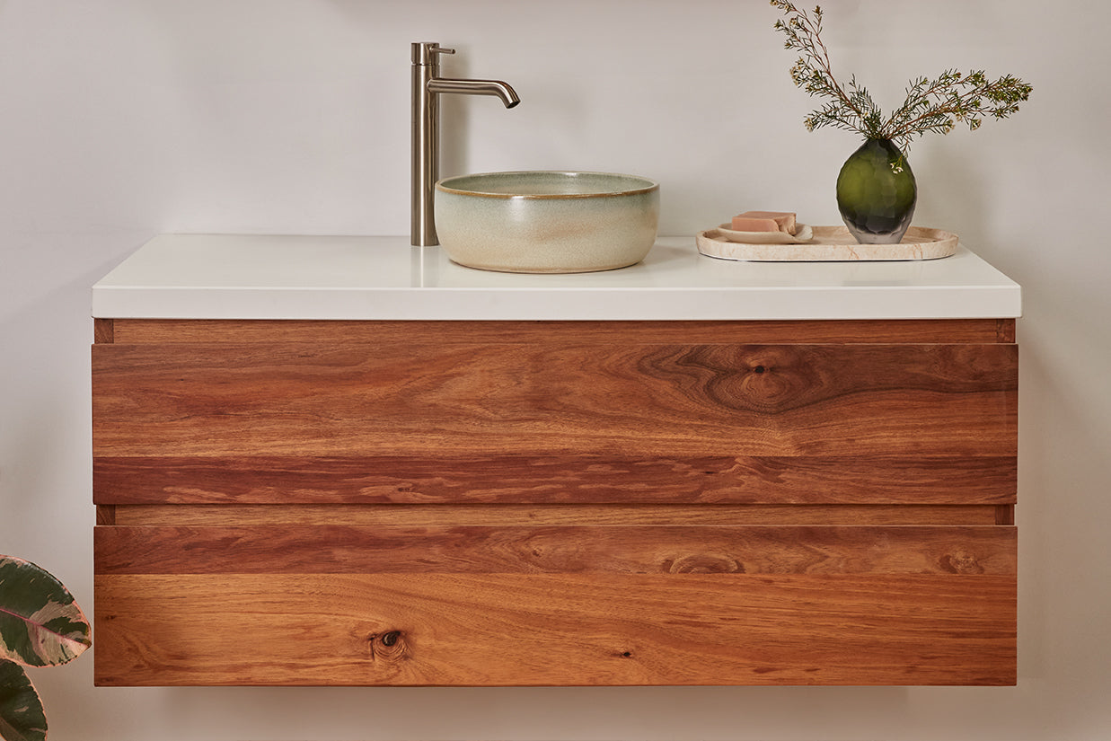 tasmanian blackwood timber vanity with a white stone top