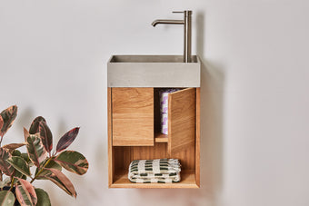 Powder room vanity with integrated basin