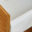 image showing white melamine internals for a timber bedside table. 