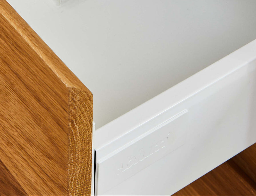 image showing white melamine internals for a timber bedside table. 