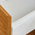 image showing white melamine internals for a timber bedside table. 