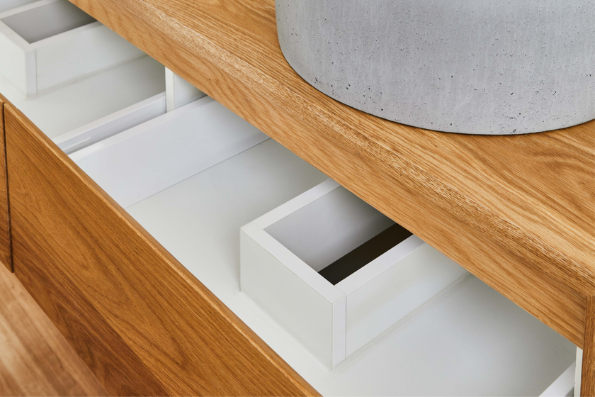 Wall hung timber vanity with white melamine internals