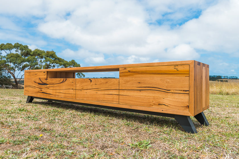 Timber Frame Tv Custom made TV unit created from solid timber and angled black legs