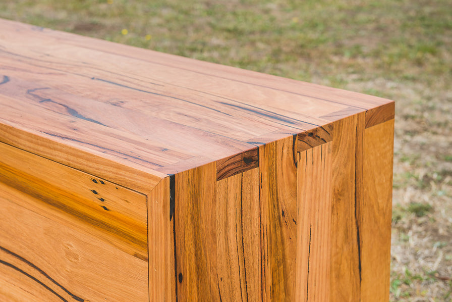 Made to order recycled timber TV cabinet with black legs and markings