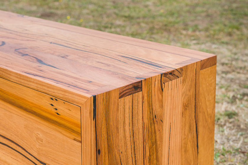 Made to order recycled timber TV cabinet with black legs and markings